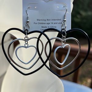 New high fashion Dangling heart earrings. Black, white and silver. Approx 3”